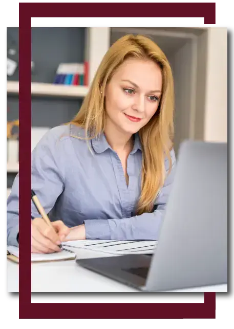 Female students working on laptop using Assignment Help Australia services